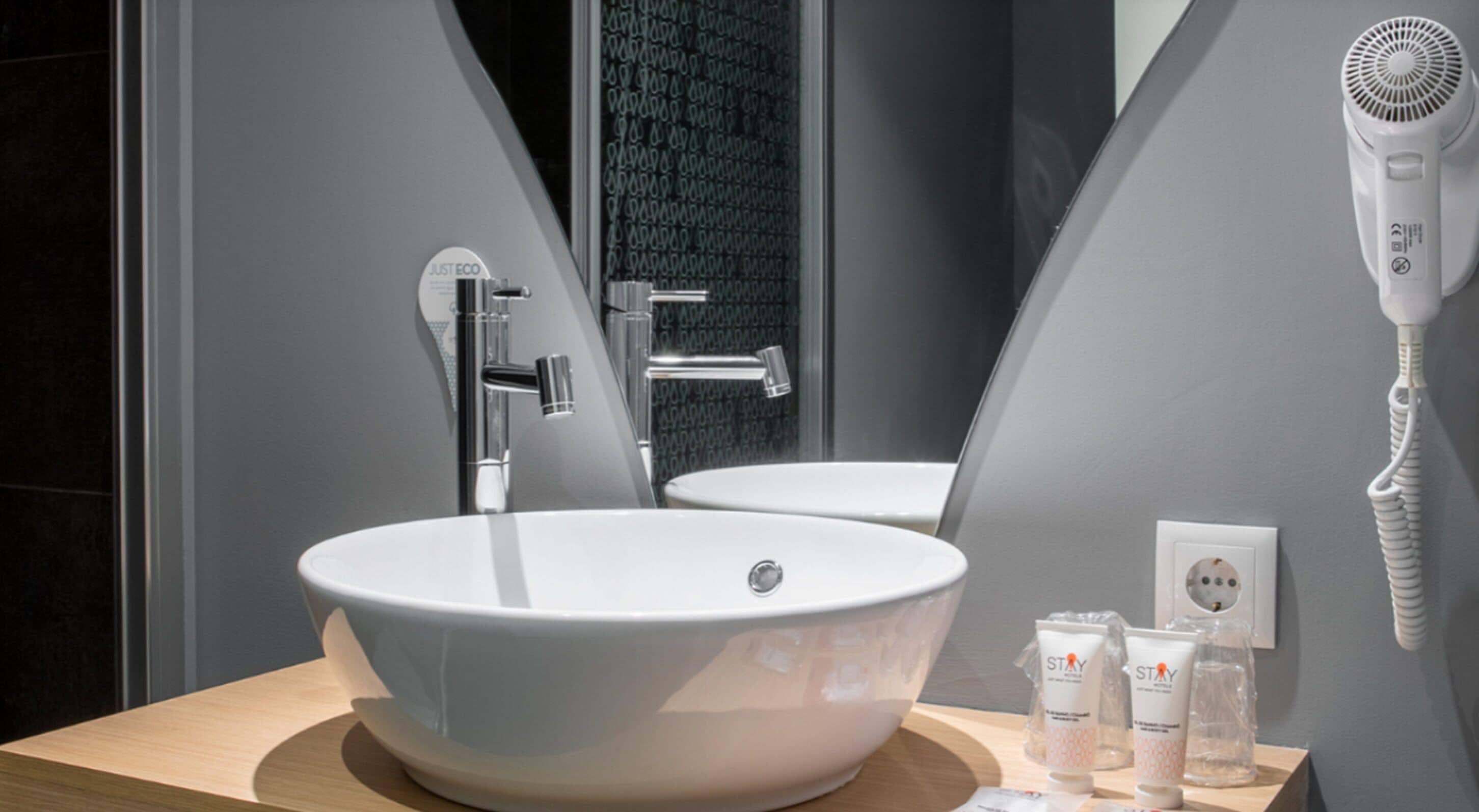 superior twin room | bathroom | shower, free toiletries, hair dryer, towels