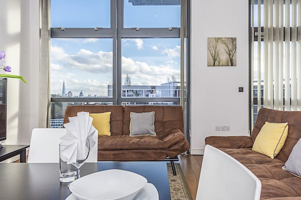 Apartment, 3 Bedrooms | Living area | Flat-screen TV