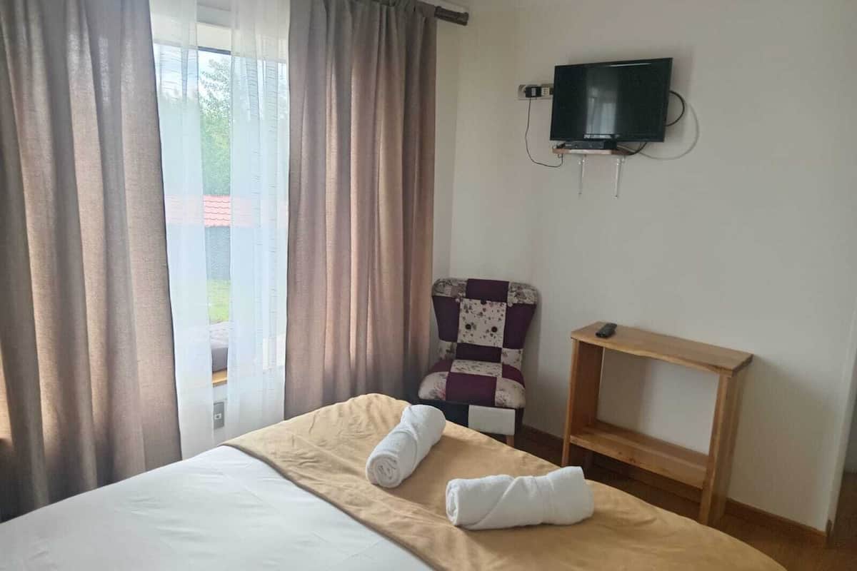 Standard-huone | Pimennysverhot, vuodevaatteet