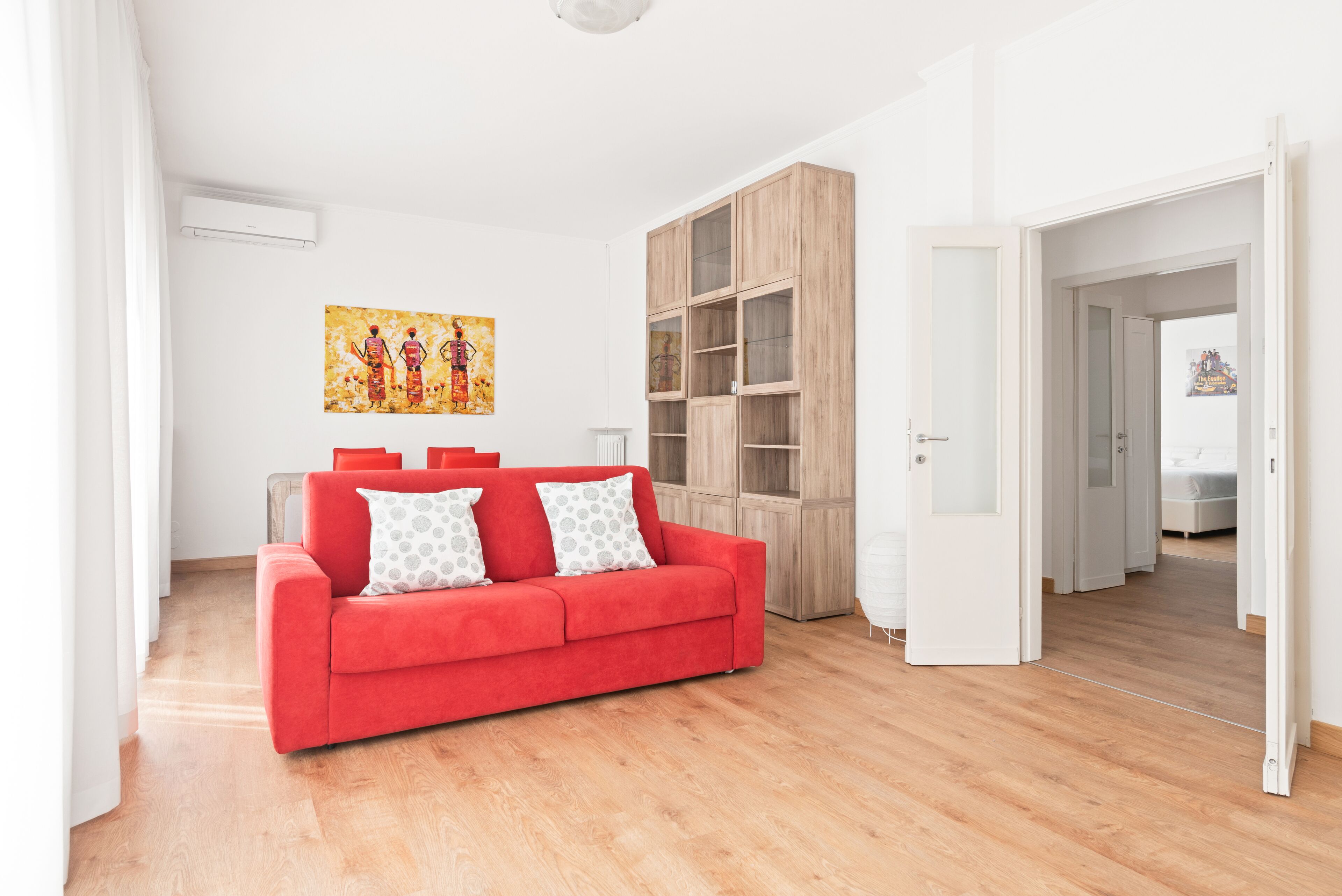 Apartamento, 2 habitaciones | Zona de estar | Una televisión de pantalla plana