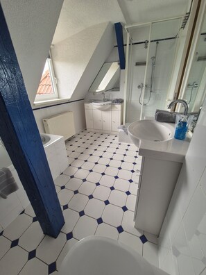 Panoramic Duplex | Bathroom | Shower, hair dryer, towels, soap