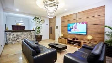 Apartment, 2 Bedrooms | Living room | Flat-screen TV, Netflix, streaming services