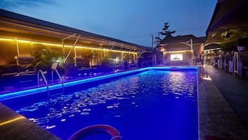 Outdoor pool, pool umbrellas, sun loungers