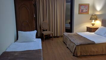 Triple Room, Balcony | Cribs/infant beds, rollaway beds, free WiFi, bed sheets