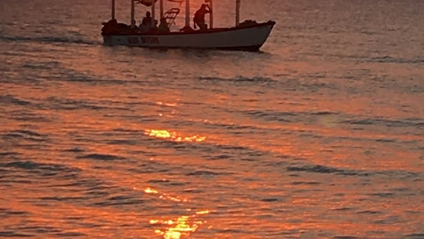 A boat on calm waters during sunset. - Solet's Paradise Negril (Negril)