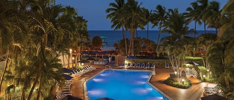 Outdoor pool, open 7:00 AM to 8:00 PM, pool umbrellas, pool loungers