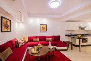 Televisión de pantalla plana, películas con cargo y oficina 