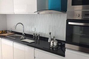 Fridge, microwave, oven, stovetop - Premium Suite #19-Beautiful & Modern Apartments building in Usaquen (Bogota)