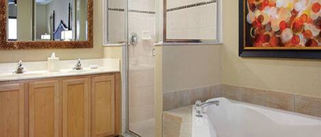 Combined shower/tub, hair dryer, towels, soap