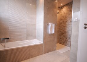 Bathtub, hair dryer, towels