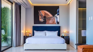 A modern bedroom with a large bed, a horse painting on the wall, and a view of greenery through the window.