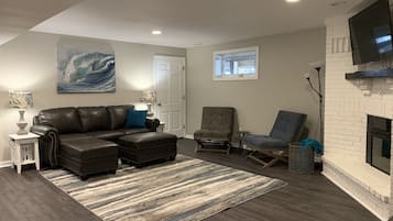 TV, fireplace, video game console, table football