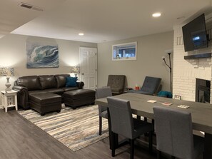 TV, fireplace, video-game console, foosball