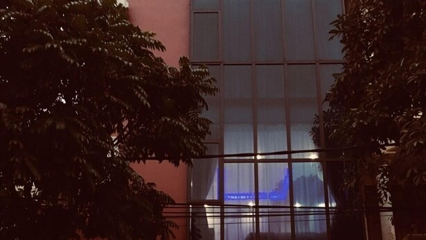 The exterior of a hotel with a sign reading "Easy Hotel". - Fasy Hotel (Vinh Phuc)