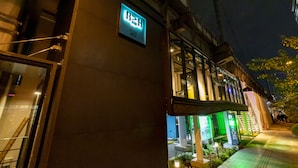 A building with a sign indicating a restaurant or cafe.