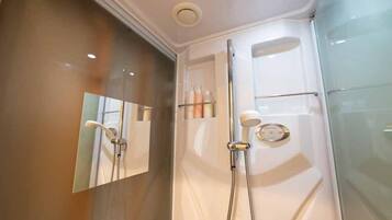 Shower, free toiletries, hair dryer, slippers