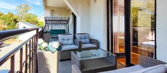 Appartement central de 2 chambres de 65 m² avec parking gratuit et grande terrasse