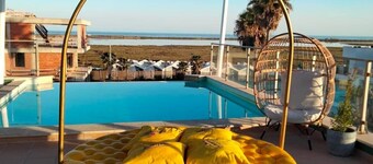 Stijlvol appartement met een prachtig uitzicht op de Ria Formosa en de zee in Fuseta.