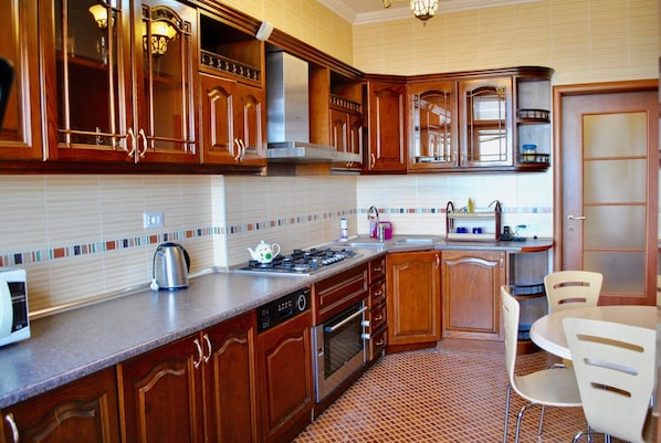 Apartment | Private kitchen | Fridge, stovetop, dishwasher, electric kettle