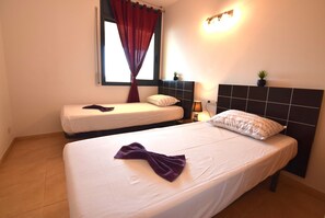 3 slaapkamers, een strijkplank/strijkijzer, gratis wifi