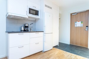 Studio Apartment Basement Single Use | Private kitchenette | Full-size fridge, microwave, stovetop, coffee/tea maker