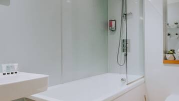 The Penthouse | Bathroom | Shower, free toiletries, hair dryer, towels
