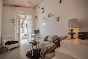 Deluxe-Apartment (9) | Wohnbereich | Flachbildfernseher