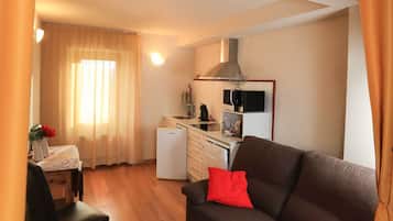 Comfort Apartment, 1 Bedroom | Living room | 80-cm flat-screen TV with digital channels, TV