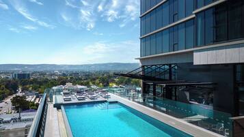 Outdoor pool, open 7:00 AM to 9:00 PM, sun loungers