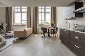 Luxury Suite (3) | Living area | Smart TV, streaming services