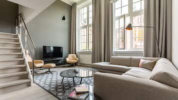 Suite superior (4) | Área de sala de estar | Smart TV y servicios de streaming