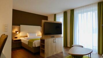 Estudio empresarial, 1 cama Queen size, para no fumadores, cocina | 1 habitación, ropa de cama de alta calidad y escritorio