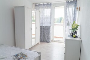 Chambre Double Deluxe, balcon | Fer et planche à repasser, Wi-Fi gratuit, draps fournis