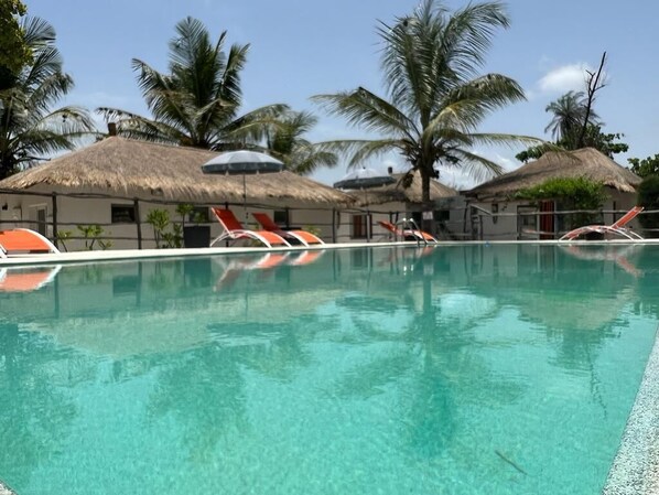 Outdoor pool, open 9:30 AM to 7:30 PM, pool loungers