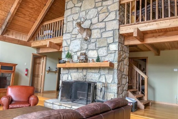 Living Room with Wood Burning Fireplace