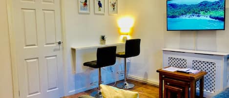 Fountain View Apartment | Living area | 50-inch flat-screen TV with satellite channels, TV