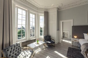 Suíte superior, para não fumantes | Individualmente decorados, individualmente mobiliados, cortinas blackout