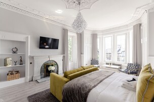 Suíte superior, para não fumantes | Individualmente decorados, individualmente mobiliados, cortinas blackout