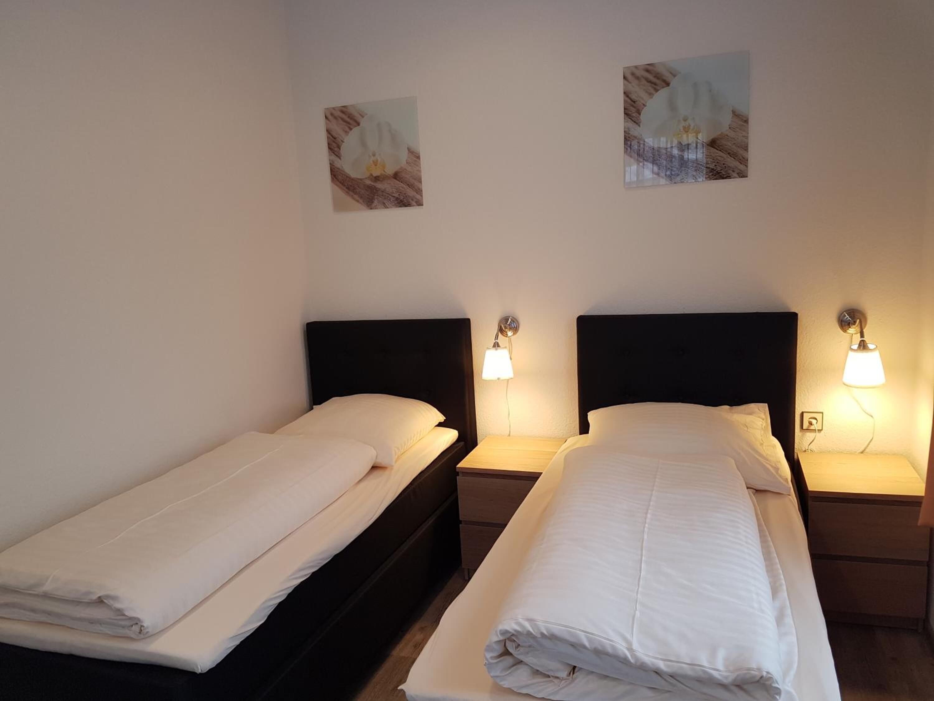 1 bedroom, premium bedding, blackout curtains, soundproofing