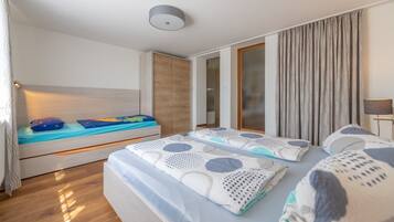 Blackout curtains, iron/ironing board, free WiFi, bed sheets