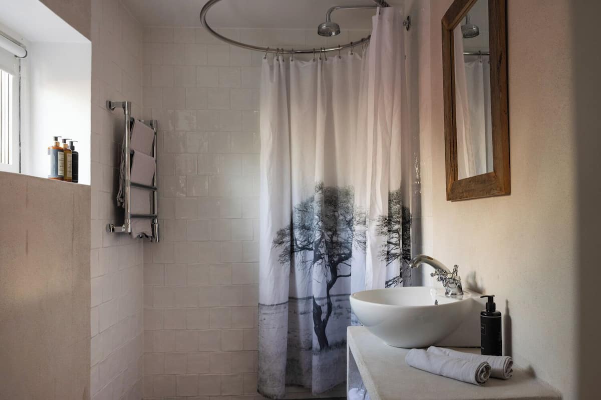 deluxe double room | bathroom | shower, free toiletries, towels, soap