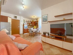 Apartment, Terrace (Matteo A4) | Living area | Flat-screen TV