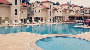 Outdoor pool, pool umbrellas, pool loungers