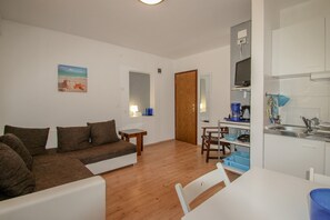 Apartment (Milena A2+1) | Living area | Flat-screen TV - Milena (Novigrad)