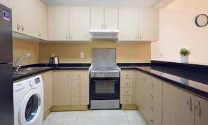 Apartment (12) | Private kitchen | Full-sized fridge, microwave, oven, stovetop