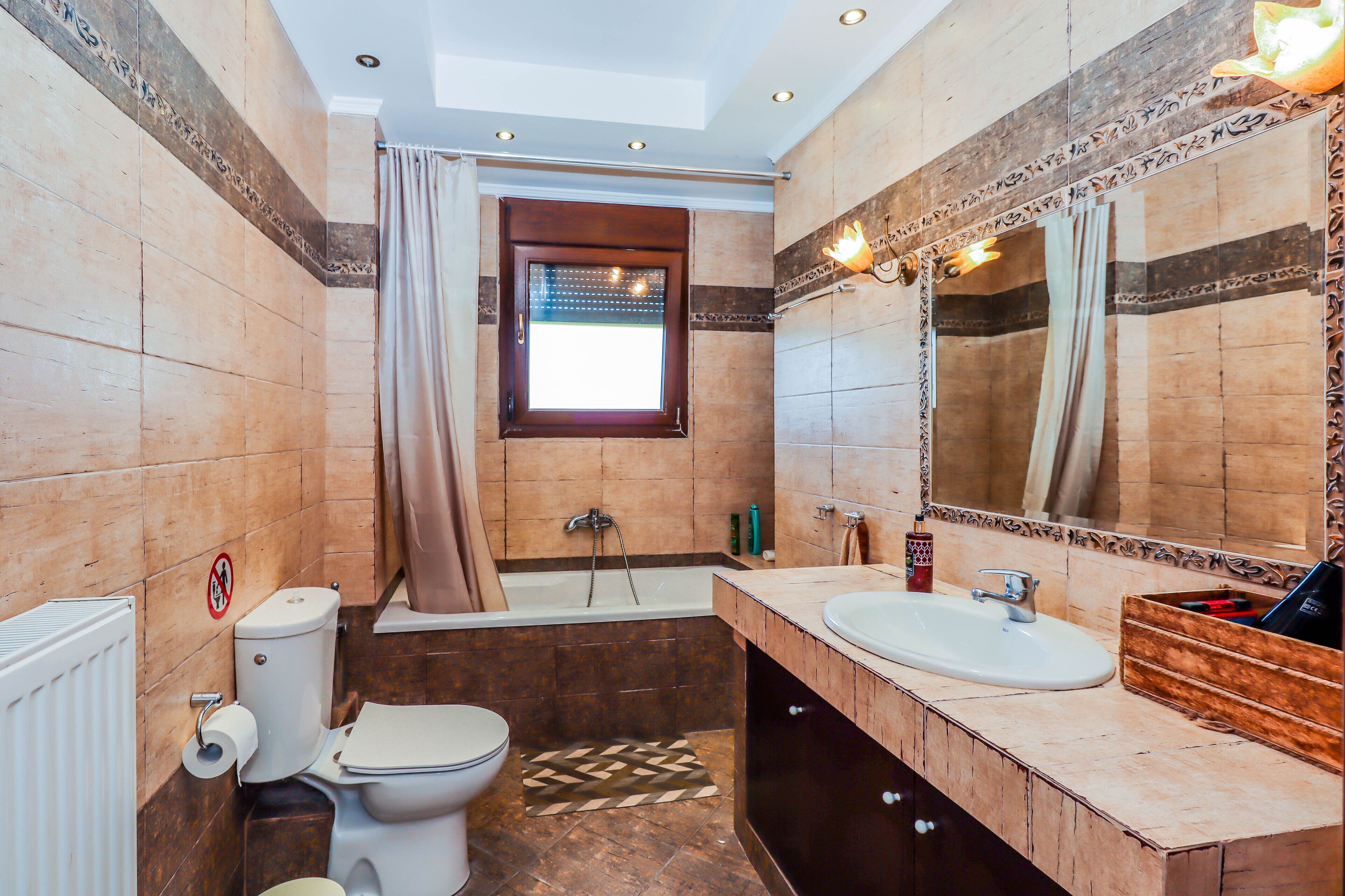 Combined shower/tub, hair dryer, towels, soap