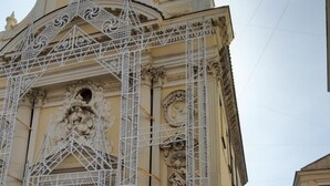A historic building with ornate architectural details and scaffolding. - B&B Al Portone (Pagani)