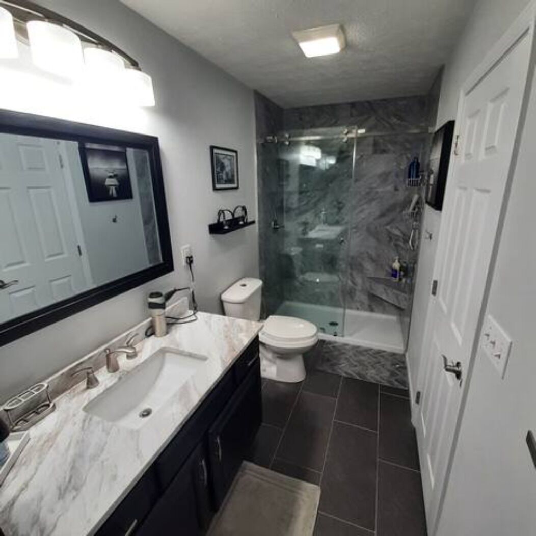 Combined shower/tub, hair dryer, towels, soap