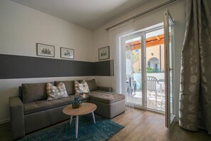 Departamento (A2+2) | Sala de estar | Televisión de pantalla plana 