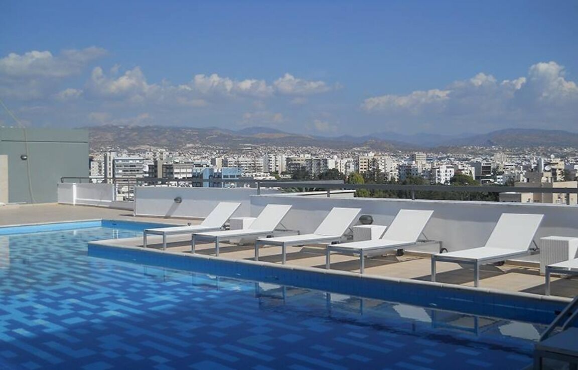 Outdoor pool, open 9:00 AM to 9:00 PM, pool loungers